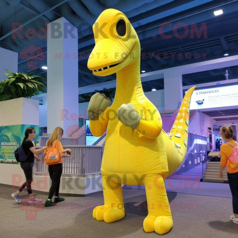 Lemon Yellow Brachiosaurus mascot costume character dressed with a Bikini and Backpacks