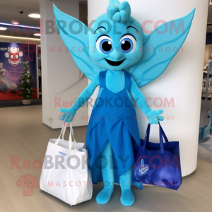 Cyan Tooth Fairy mascot costume character dressed with a Swimwear and Tote bags