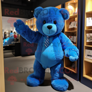 Blue Teddy Bear mascot costume character dressed with a Vest and Clutch bags