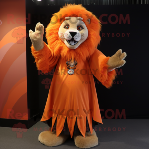 Orange Tamer Lion mascot costume character dressed with a Empire Waist Dress and Shawls