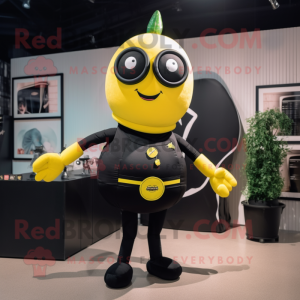 Black Lemon mascot costume character dressed with a Bikini and Suspenders