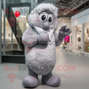 Silver Heart mascot costume character dressed with a Coat and Mittens