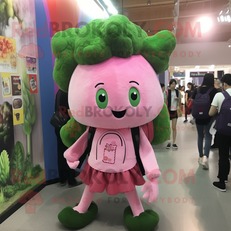 Pink Broccoli mascot costume character dressed with a Circle Skirt and Backpacks