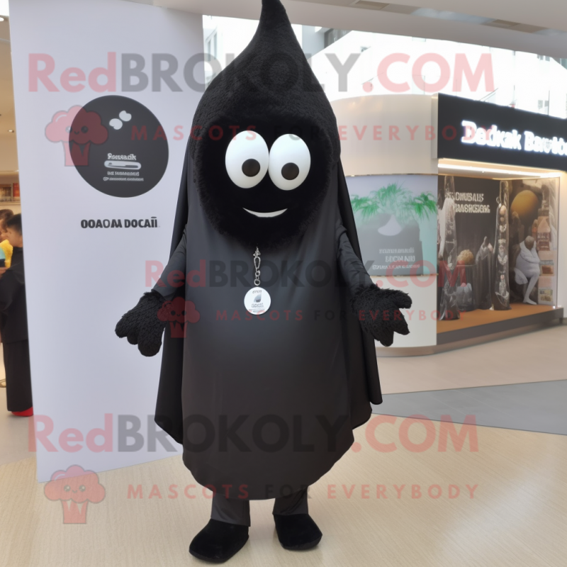 Black Shakshuka mascot costume character dressed with a Trousers and Tie pins