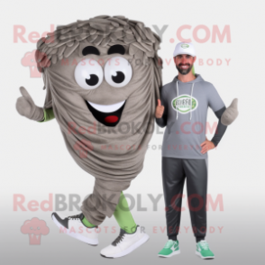 Gray Pesto Pasta mascot costume character dressed with a Joggers and Shoe clips