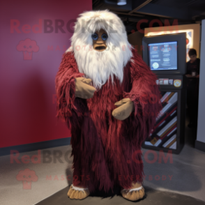 Maroon Yeti mascot costume character dressed with a Corduroy Pants and Shawls