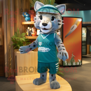 Teal Bobcat mascot costume character dressed with a Board Shorts and Headbands