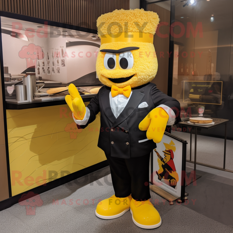 Yellow Ramen mascot costume character dressed with a Tuxedo and Gloves