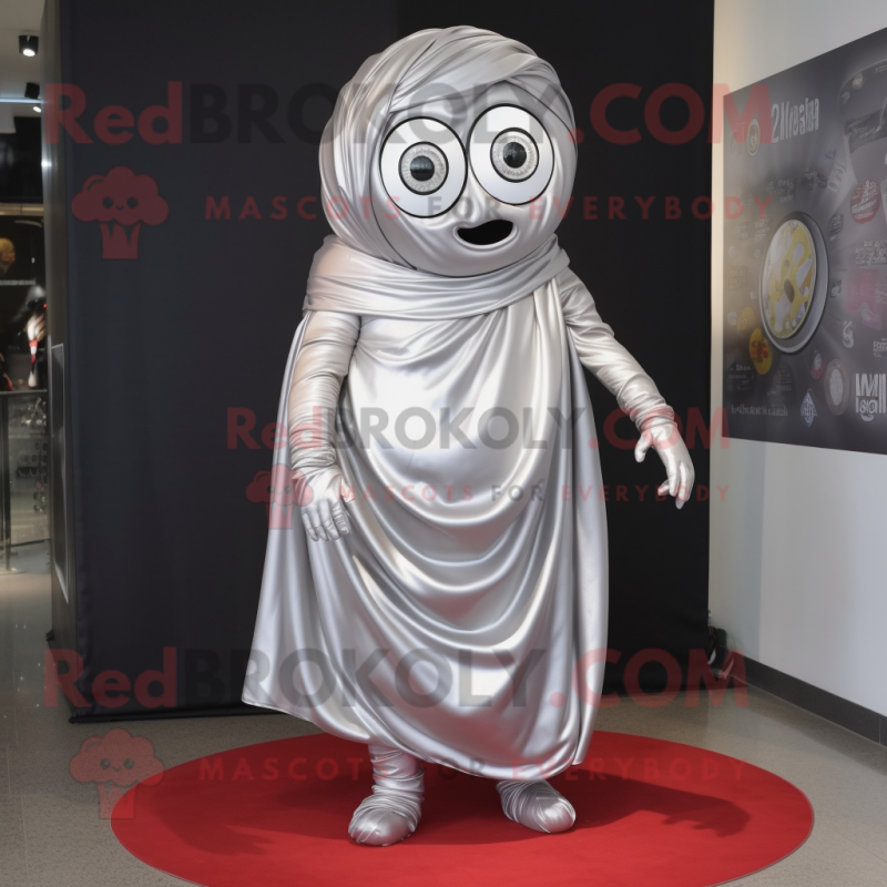 Silver Cyclops mascot costume character dressed with a Wrap Dress and Shoe laces