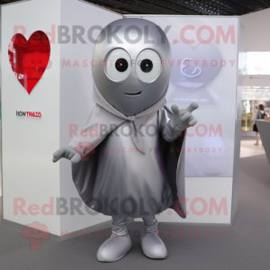 Silver Heart mascot costume character dressed with a Hoodie and Tie pins