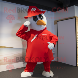 Red Gull mascot costume character dressed with a Jumpsuit and Hats