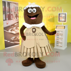 Beige Chocolates mascot costume character dressed with a Skirt and Tie pins