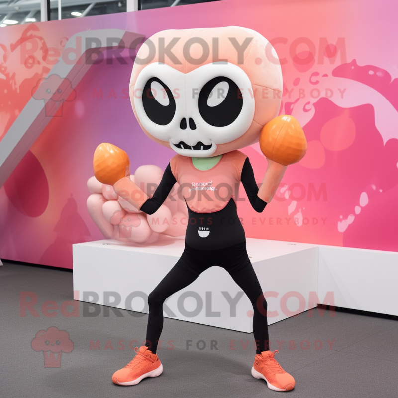 Peach Skull mascot costume character dressed with a Yoga Pants and Mittens