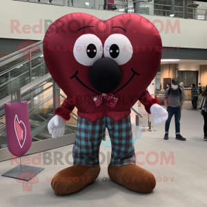 Maroon Heart Shaped Balloons mascot costume character dressed with a Flannel Shirt and Shoe laces