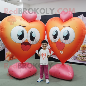 Peach Heart Shaped Balloons mascot costume character dressed with a Henley Shirt and Coin purses