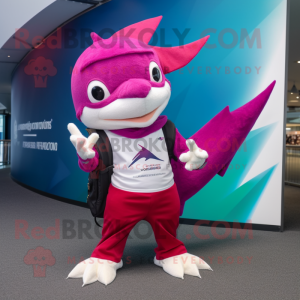 Magenta Swordfish mascot costume character dressed with a Skinny Jeans and Wallets