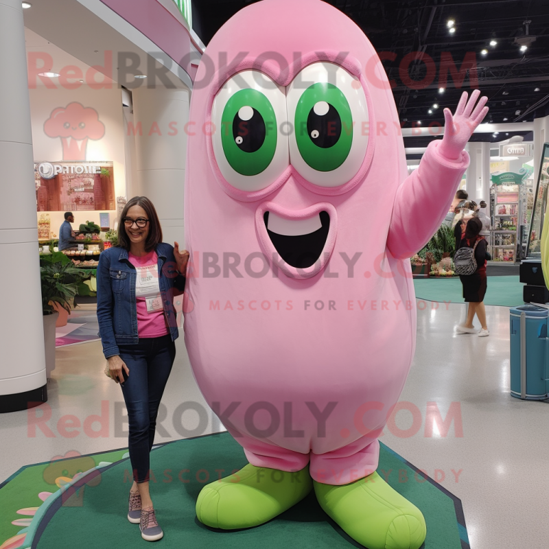 Pink Green Bean mascot costume character dressed with a Mom Jeans and Rings