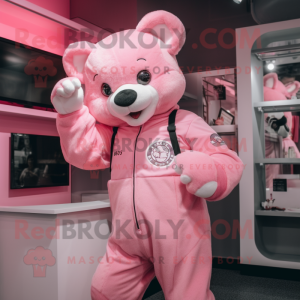 Pink Teddy Bear mascot costume character dressed with a Overalls and Gloves