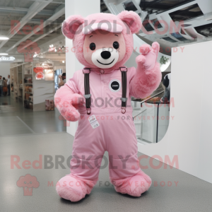 Pink Teddy Bear mascot costume character dressed with a Overalls and Gloves