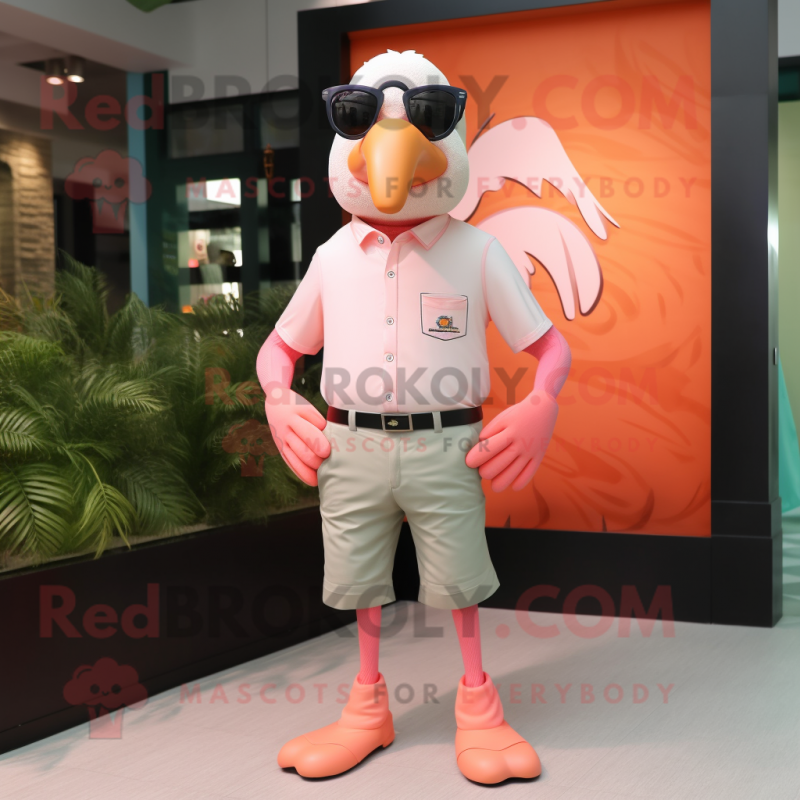 Peach Flamingo mascot costume character dressed with a Chinos and Eyeglasses