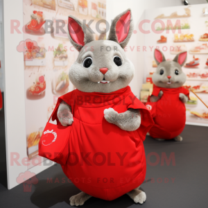 Red Chinchilla mascot costume character dressed with a Wrap Dress and Clutch bags