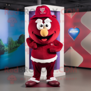 Maroon Heart mascot costume character dressed with a Bermuda Shorts and Headbands