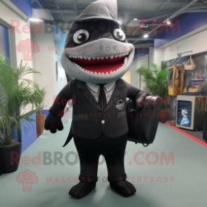 Black Shark mascot costume character dressed with a Suit and Messenger bags