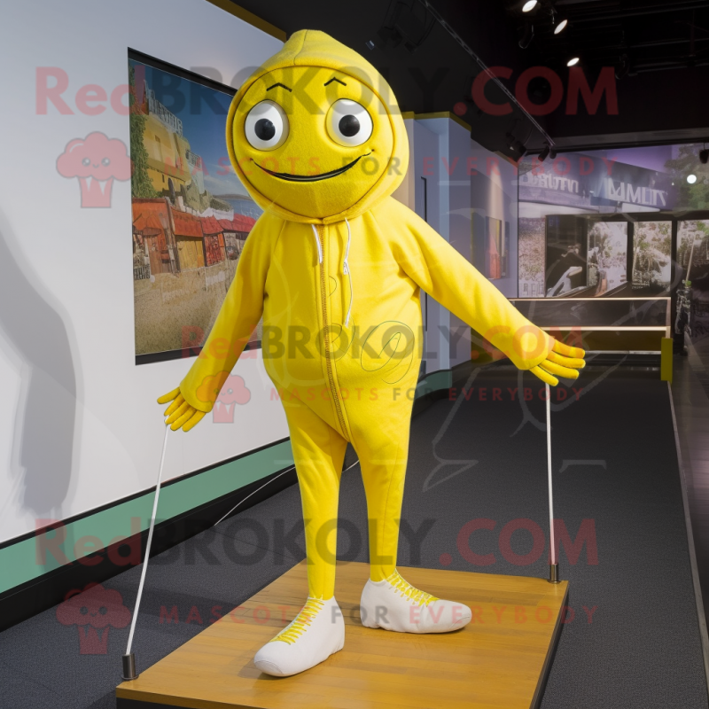 Yellow Tightrope Walker mascot costume character dressed with a Hoodie and Caps