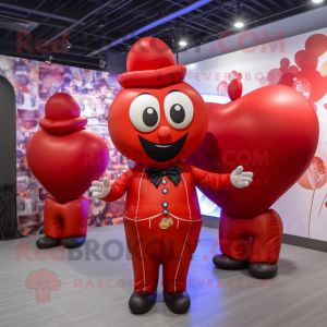 Red Heart Shaped Balloons mascot costume character dressed with a Waistcoat and Bracelet watches