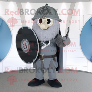 Gray Celtic Shield mascot costume character dressed with a Dress Pants and Messenger bags