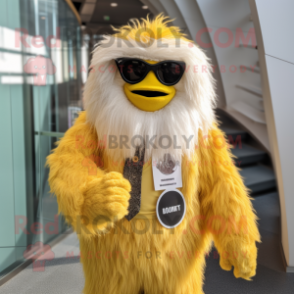 Yellow Yeti mascot costume character dressed with a Blazer and Sunglasses