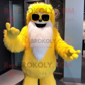 Yellow Yeti mascot costume character dressed with a Blazer and Sunglasses