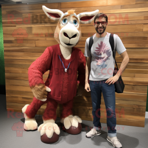 Maroon Goat mascot costume character dressed with a Boyfriend Jeans and Eyeglasses