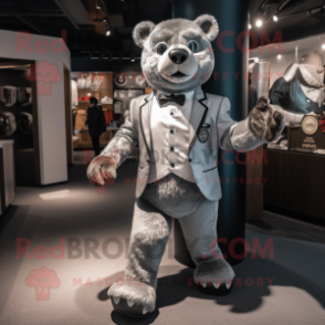 Silver Teddy Bear mascot costume character dressed with a Suit Jacket and Rings