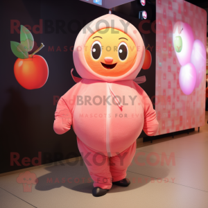 Pink Apricot mascot costume character dressed with a Leggings and Wraps