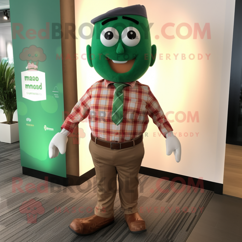 Green Tikka Masala mascot costume character dressed with a Flannel Shirt and Bow ties