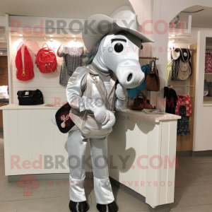 Silver Horseshoe mascot costume character dressed with a Overalls and Handbags