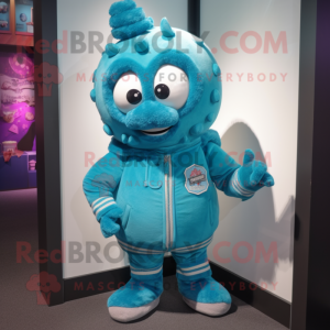 Turquoise Candy Box mascot costume character dressed with a Bomber Jacket and Scarf clips