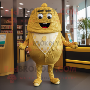 Gold Falafel mascot costume character dressed with a Playsuit and Tie pins