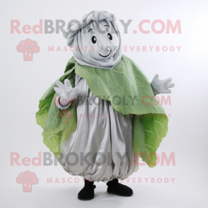 Silver Cabbage Leaf mascot costume character dressed with a Blouse and Shawl pins