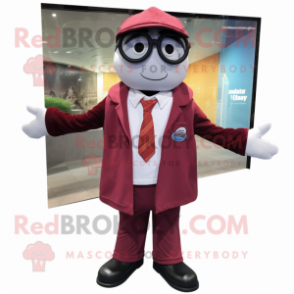 Maroon Shakshuka mascot costume character dressed with a Suit Jacket and Eyeglasses