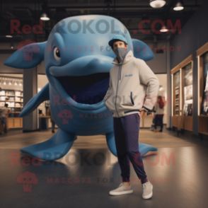 Tan Blue Whale mascot costume character dressed with a Joggers and Cummerbunds