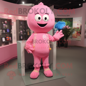 Pink Bracelet mascot costume character dressed with a Romper and Shoe laces