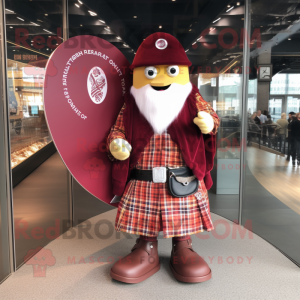 Maroon Celtic Shield mascot costume character dressed with a Flannel Shirt and Hat pins