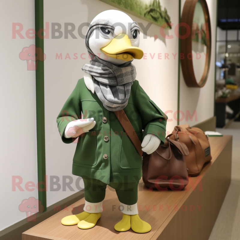 Green Geese mascot costume character dressed with a Chinos and Scarves