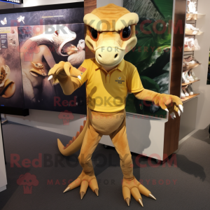 Gold Dimorphodon mascot costume character dressed with a Rugby Shirt and Foot pads