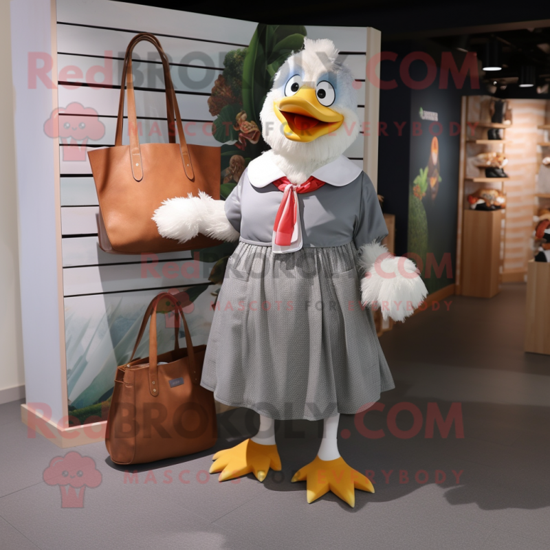 Gray Muscovy Duck mascot costume character dressed with a A-Line Skirt and Tote bags