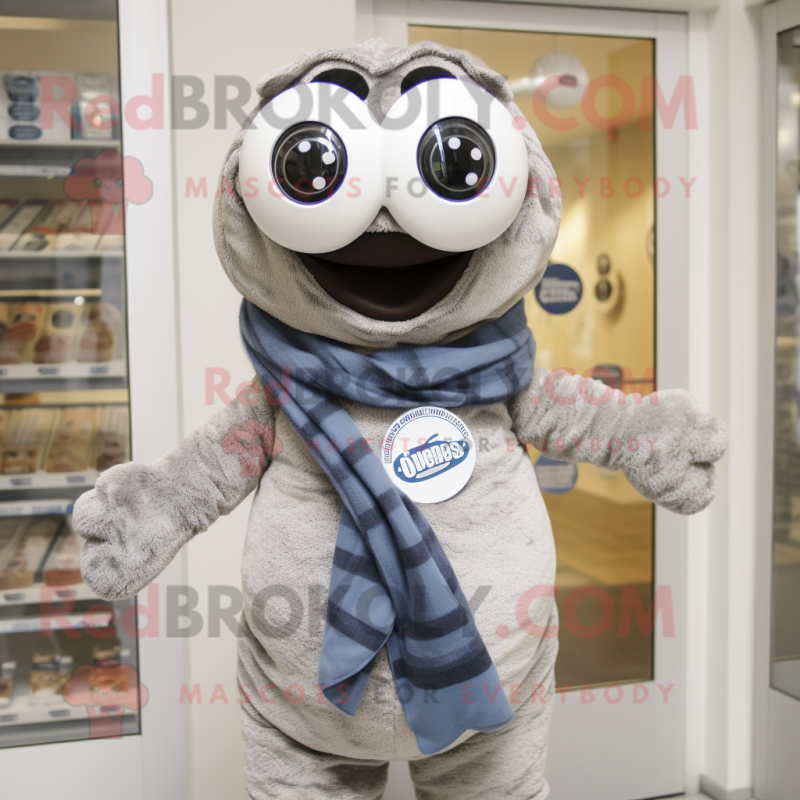 Silver Bagels mascot costume character dressed with a Button-Up Shirt and Scarves