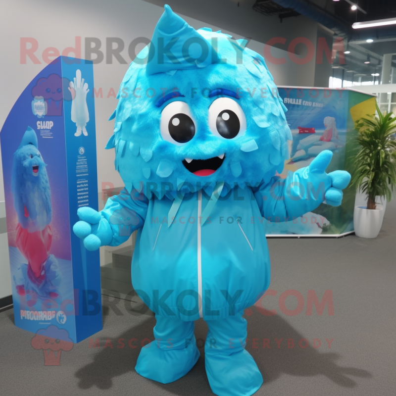 Cyan Ice mascot costume character dressed with a Raincoat and Backpacks