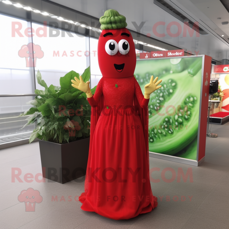 Red Cucumber mascot costume character dressed with a Maxi Dress and Headbands
